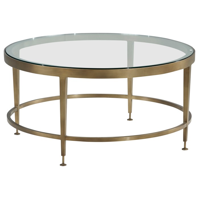 ROUND BRASS COCKTAIL TABLE @ LOBBY